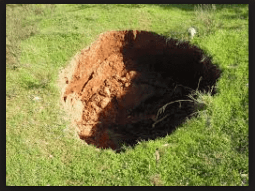 Outdoor Makeover: Dealing with Sinkholes: Why They Occur & What to Do