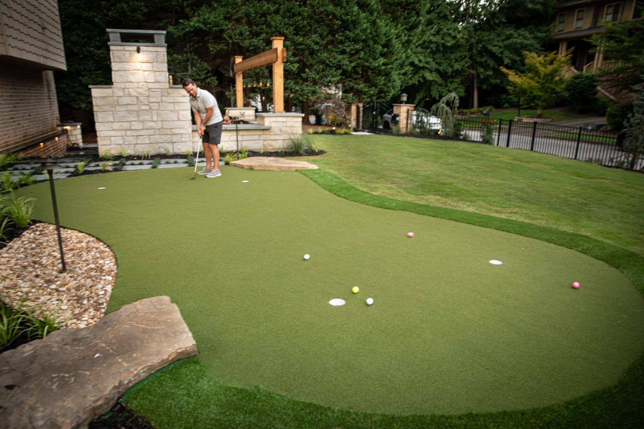 Copy of Outdoor Design Solutions3 scaled - How to Incorporate a Putting Green Into Your Backyard Design - patio design and installation Atlanta