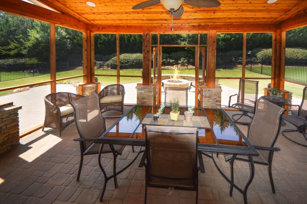 Screened porch with dining furniture