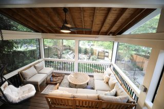 Cozy screened porch with seating area