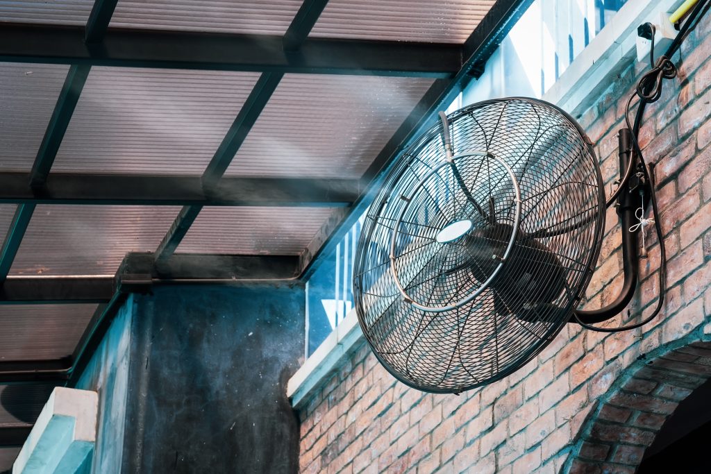 iStock 1315661567 - The Benefits of Outdoor Ceiling Fans and Misters for Comfort - outdoor living spaces Atlanta